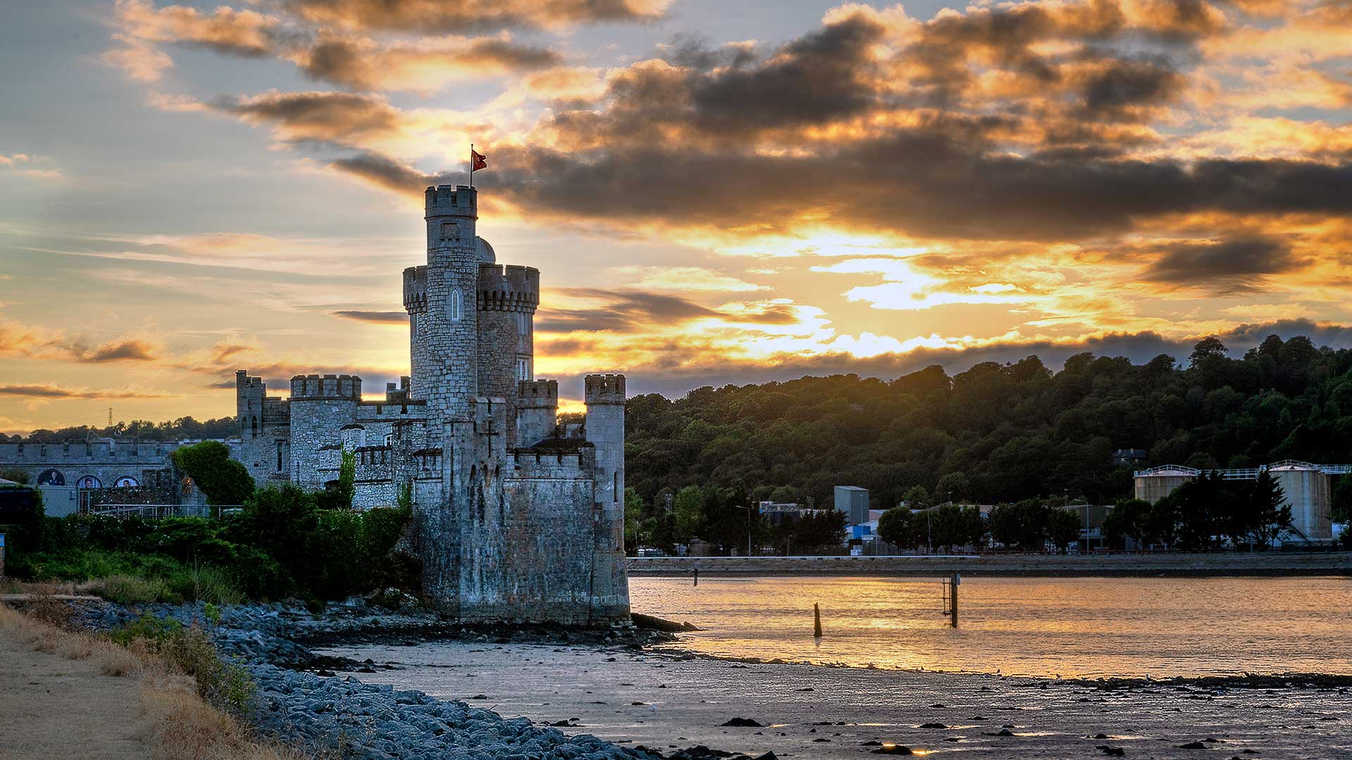 Blackrock Castle Cork against river and sunset