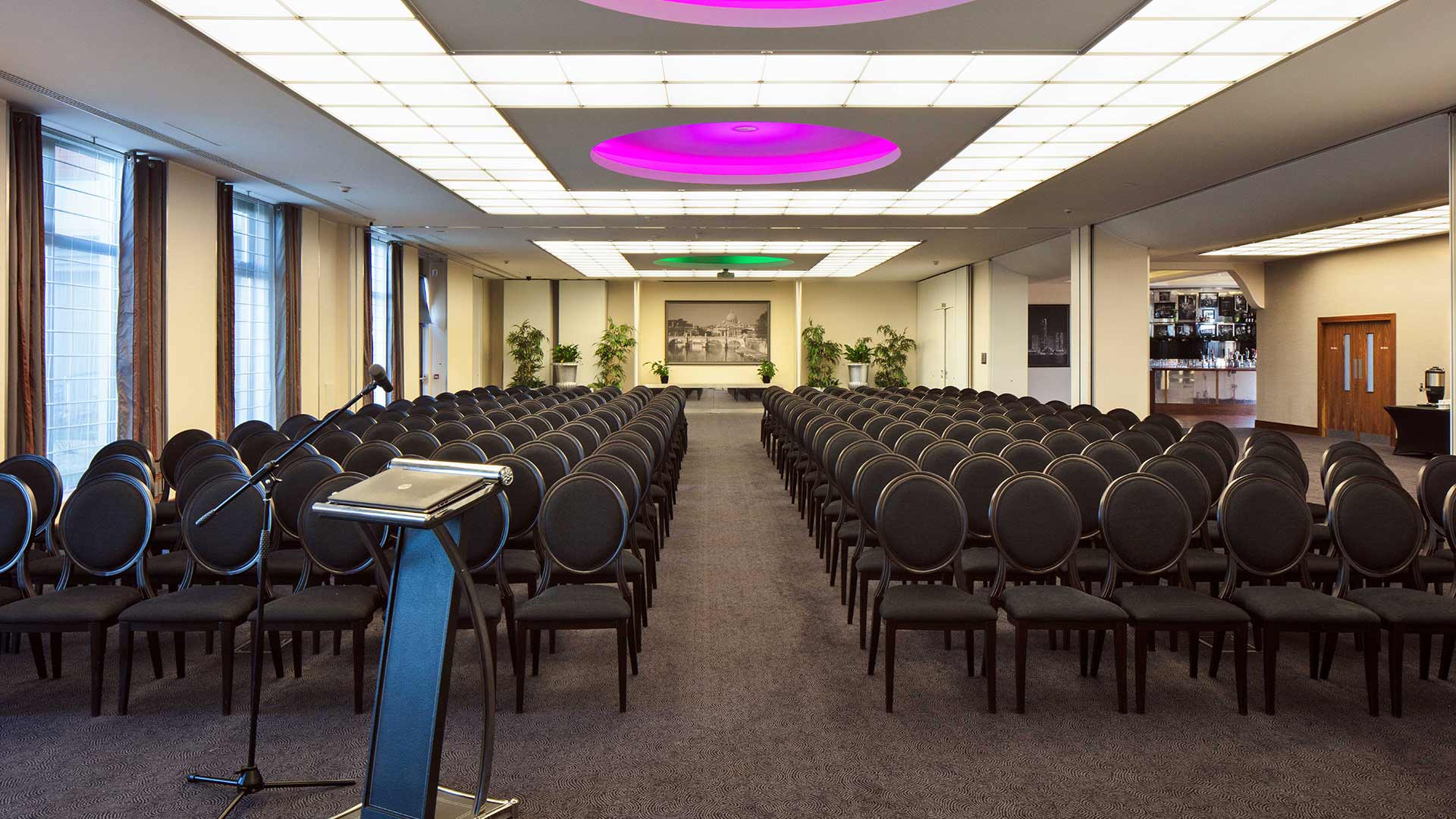 Large ballroom with seats arranged theatre style for a conference at Cork International Hotel