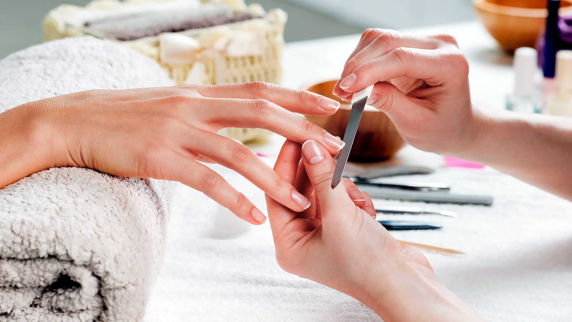 close-up of manicure treatment, filing nails