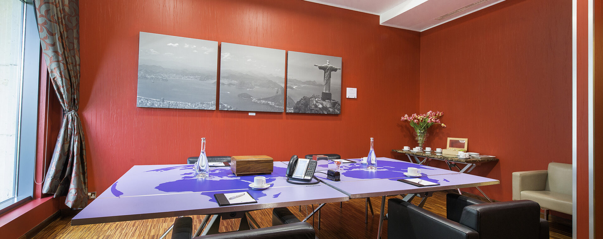 Rio De Janeiro Boardroom with vivid walls and natural daylight at Cork International Hotel