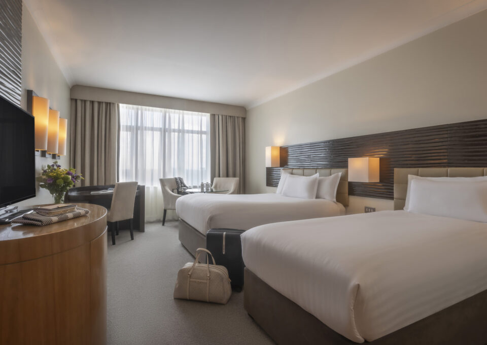 Signature twin bedroom at Cork International Hotel with 2 double beds
