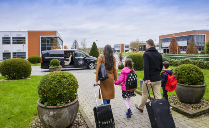 Family with suitcases