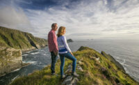Couple enjoying view at the Kerry Cliffs Co Kerry Social Media