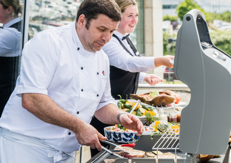 Terrace BBQ Chef serving food Portrait CIH